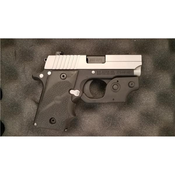 Sig Sauer P238 .380 ACP night sights, laser, and pocket holster