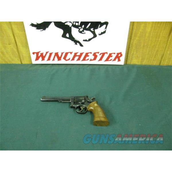 .22 Magnum 7325 Smith Wesson 48-2 MASTERPIECE 22 mrf(mag) 6 inch barrel, target rear adjustable site,grooved trigger, stippled hammer,99% conditon.Wood medallion grips, ring line. case colored hammer and trigger.