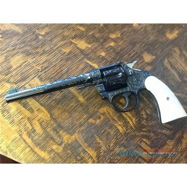 .22 Long Rifle Outstanding engraved and mother of pearl grips colt police positive target model 22lr
