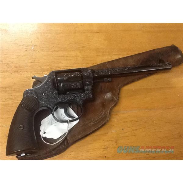 .45 Colt Engraved colt new service commerical 45 LC. Gorgeous pistol mint cond