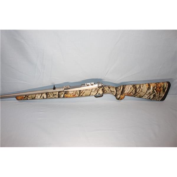 .44 Mag. 77 Series Ruger 77/44 Stainless Camo Carbine Gun is as new in its box 18 inch " barrel 07408