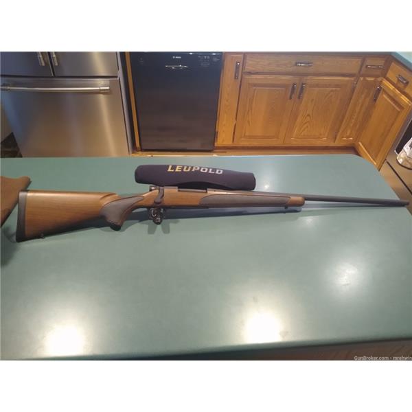 7 MM Rem. Mag. Remington 700 SPS Wood Tech 7mm Rem Mag 24 inch " barrel