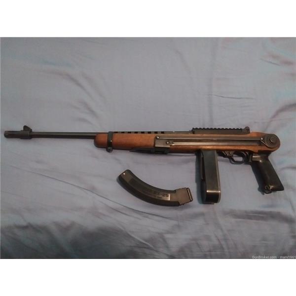 .22 Caliber (5.5mm) 10/22 Carbine Ruger / Sturm, & Co. 10-22 in Vintage Federal Ordnance folding stock 18 inch " barrel