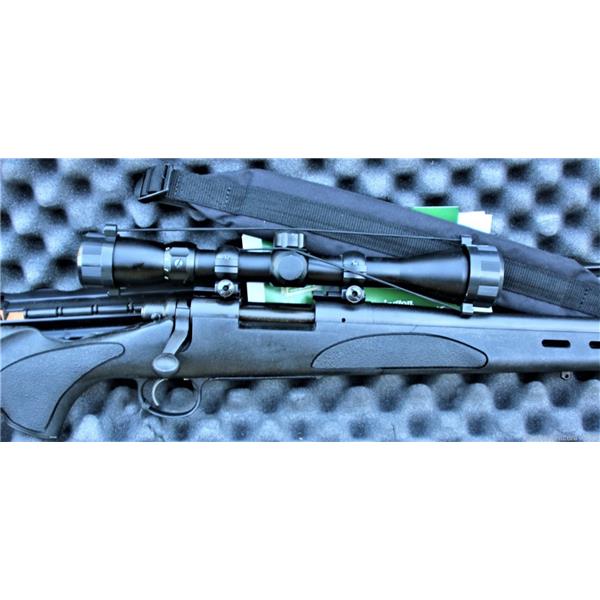 .223 Rem. Remington 700 SPS Varmint rem w/scope and hard case 26 inch " barrel