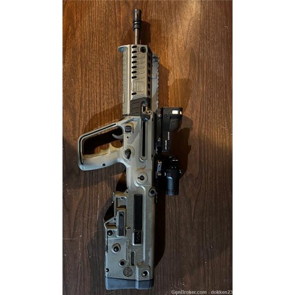 5.56mm NATO (.223 Rem.) IWI - Israel Weapon Industries Tavor X95 FDE with Mepro M21 and flip up/down 3x magnification 16 inch " barrel