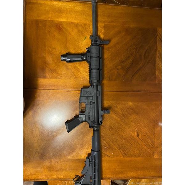 5.56mm NATO (.223 Rem.) Used Bushmaster XM15-E2S AR-15 Rifle