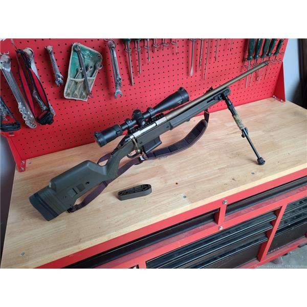 6.5 Creedmoor American Rifle Predator Ruger / Sturm, & Co. CM Go Wild Bronze, Magpul Stock, Nikon 14x Scope 22 inch " barrel