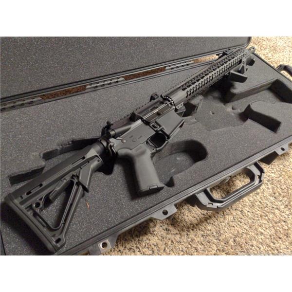5.56mm NATO (.223 Rem.) Bushmaster AR15 XM15-E2S Geissele trigger comes with Pelican case 16 inch " barrel