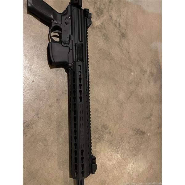 9mm Luger Sig Sauer mpx rifle with raptor and geissele 16 inch " barrel