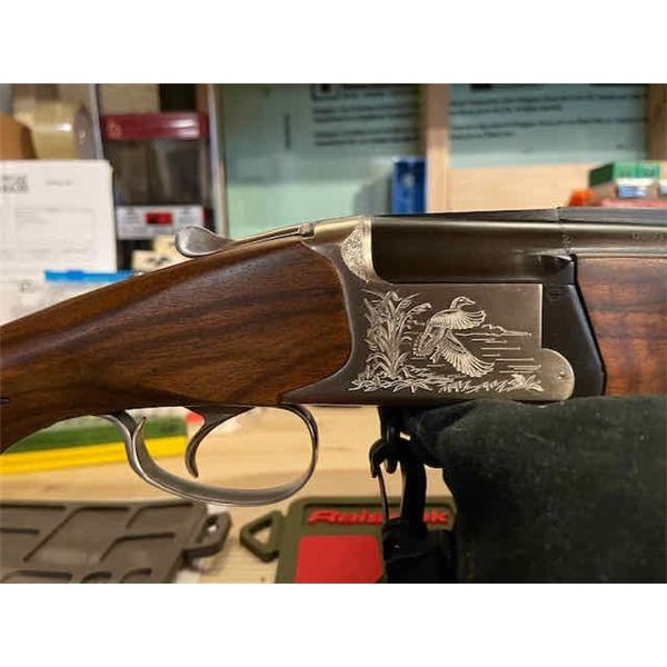 SPR-300 Excellent O/U Remington (12ga)