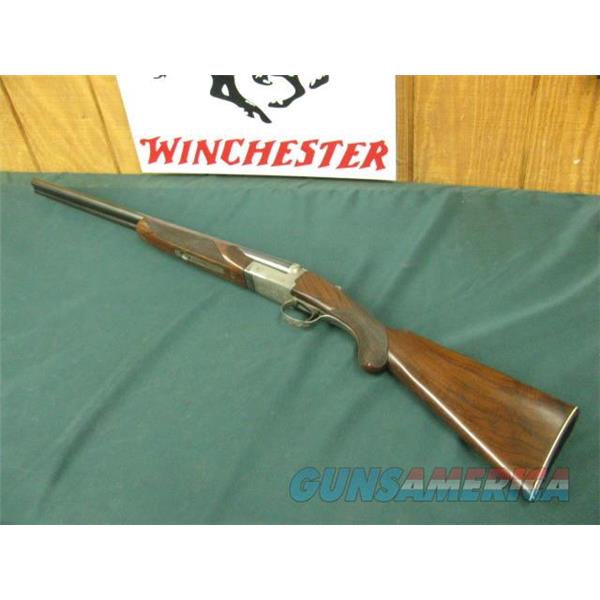 7316 Winchester 23 Pigeon XTR 20 gauge 25 inch barrels ic/ic, oil finished, not a mark on it. butt plate, vent rib ejectors, single select trigger, white front bead and mid bead, rose scroll engraved coin silver receiver.99% condition