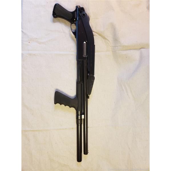 Remington 870 with factory top folding stock